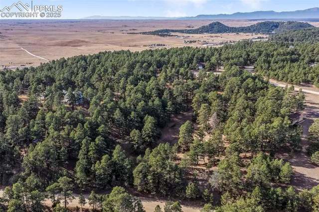 a view of a lake with mountains in the background