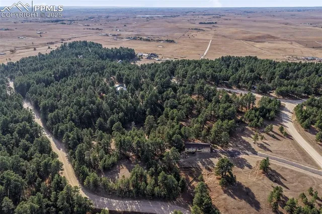 an aerial view of beach and residential space