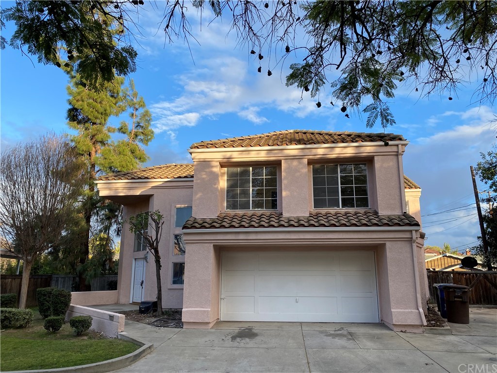 11722 Lower Azusa Road El Monte, CA 91732 - Photo 1 of 1 a view of a house with a tree