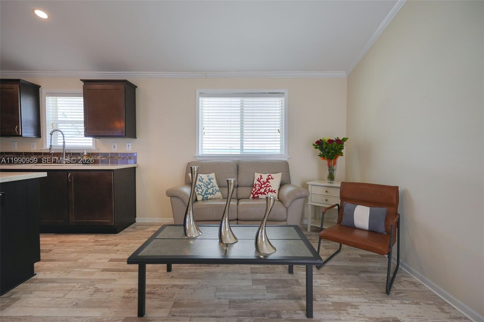 112 Tweedy Pie Terrace Key Largo, FL 33037 - Photo 19 of 39 a living room with furniture a table and chair