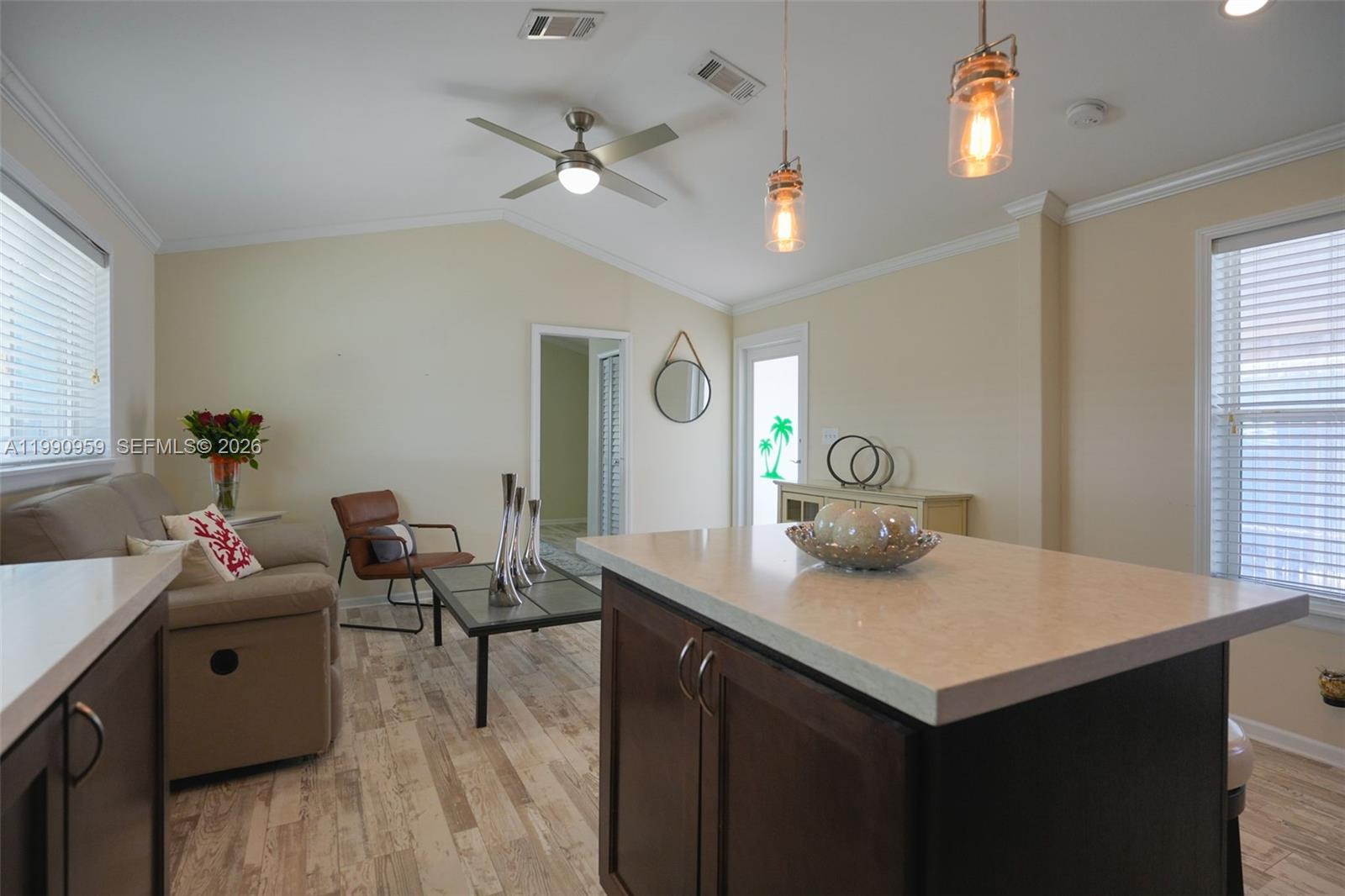 112 Tweedy Pie Terrace Key Largo, FL 33037 - Photo 21 of 39 a view of a dining room with furniture and wooden floor