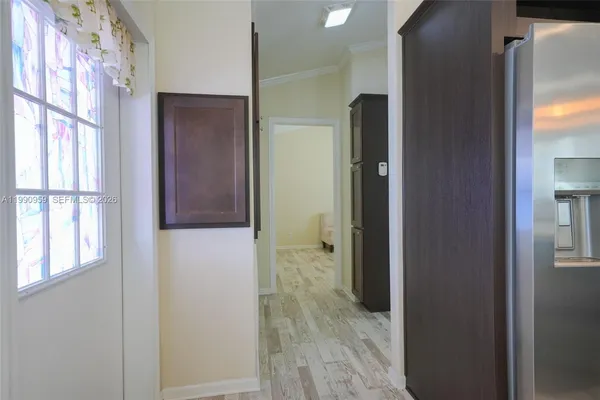 a view of a bathroom with a glass door