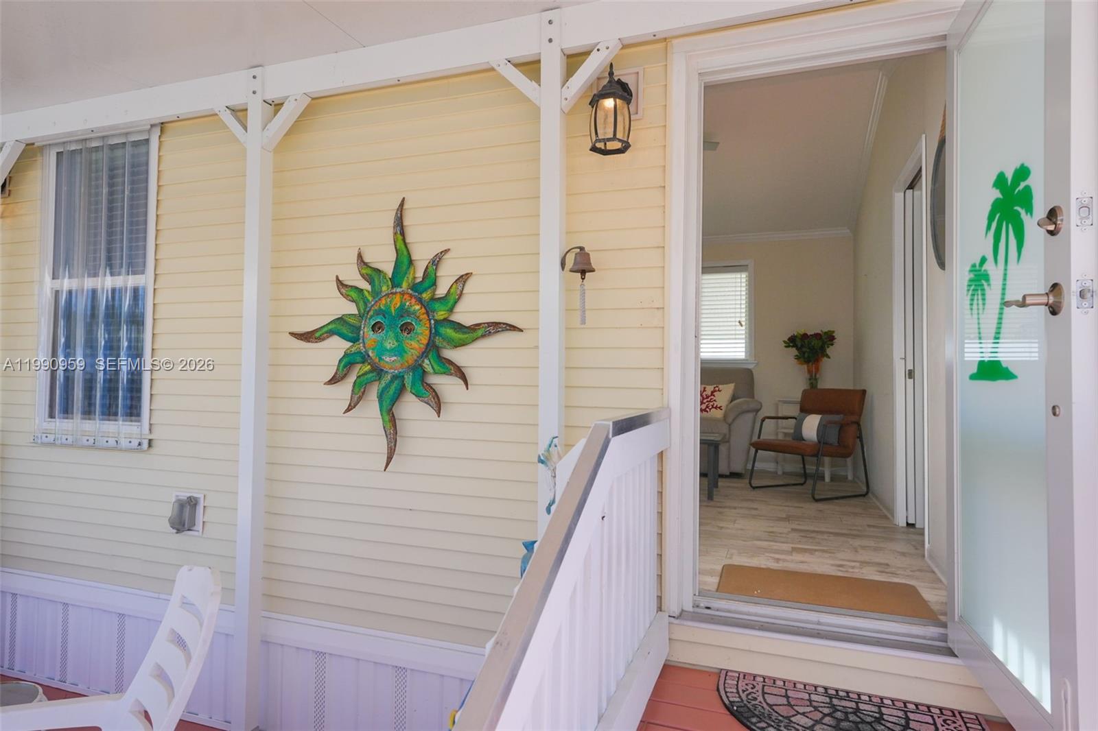 112 Tweedy Pie Terrace Key Largo, FL 33037 - Photo 36 of 39 a view of balcony with wooden floor and a potted plant
