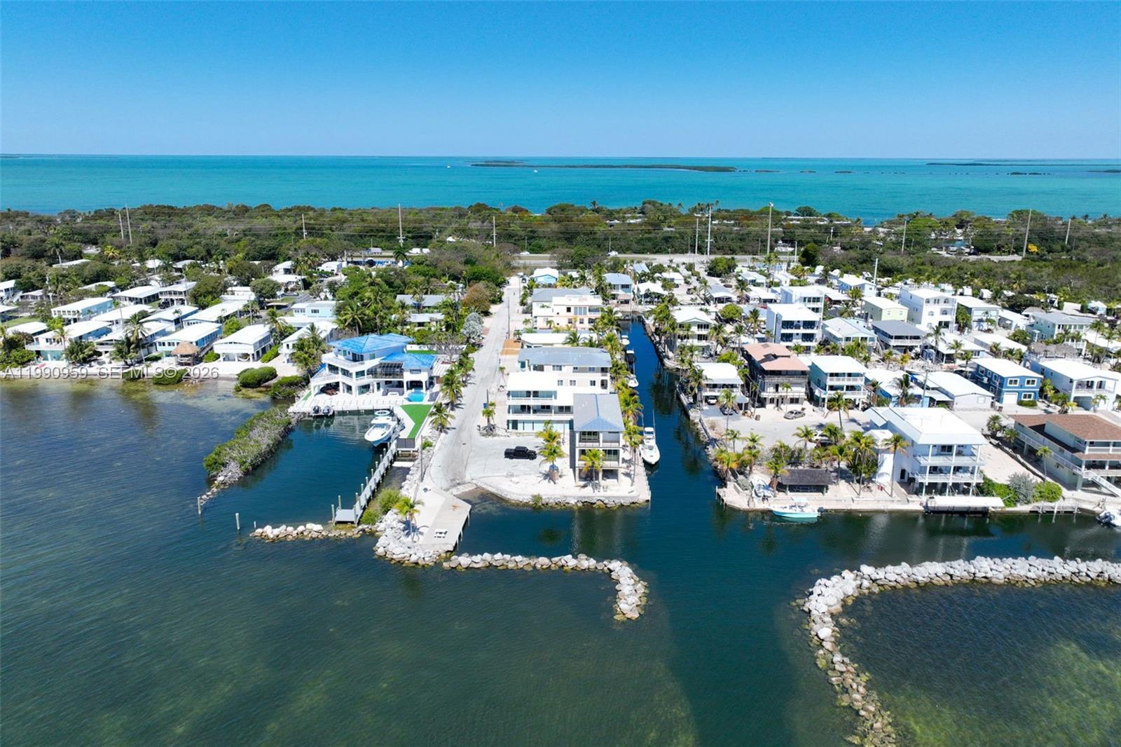 112 Tweedy Pie Terrace Key Largo, FL 33037 - Photo 39 of 39 an aerial view of residential houses with outdoor space and lake view
