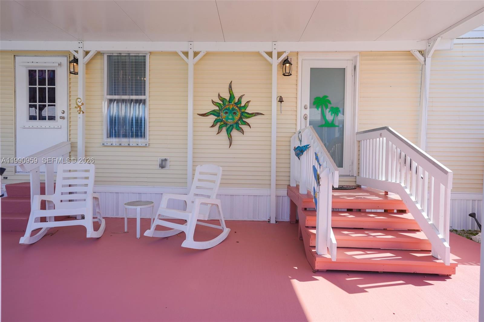 112 Tweedy Pie Terrace Key Largo, FL 33037 - Photo 5 of 39 a view of an entryway with wooden floor