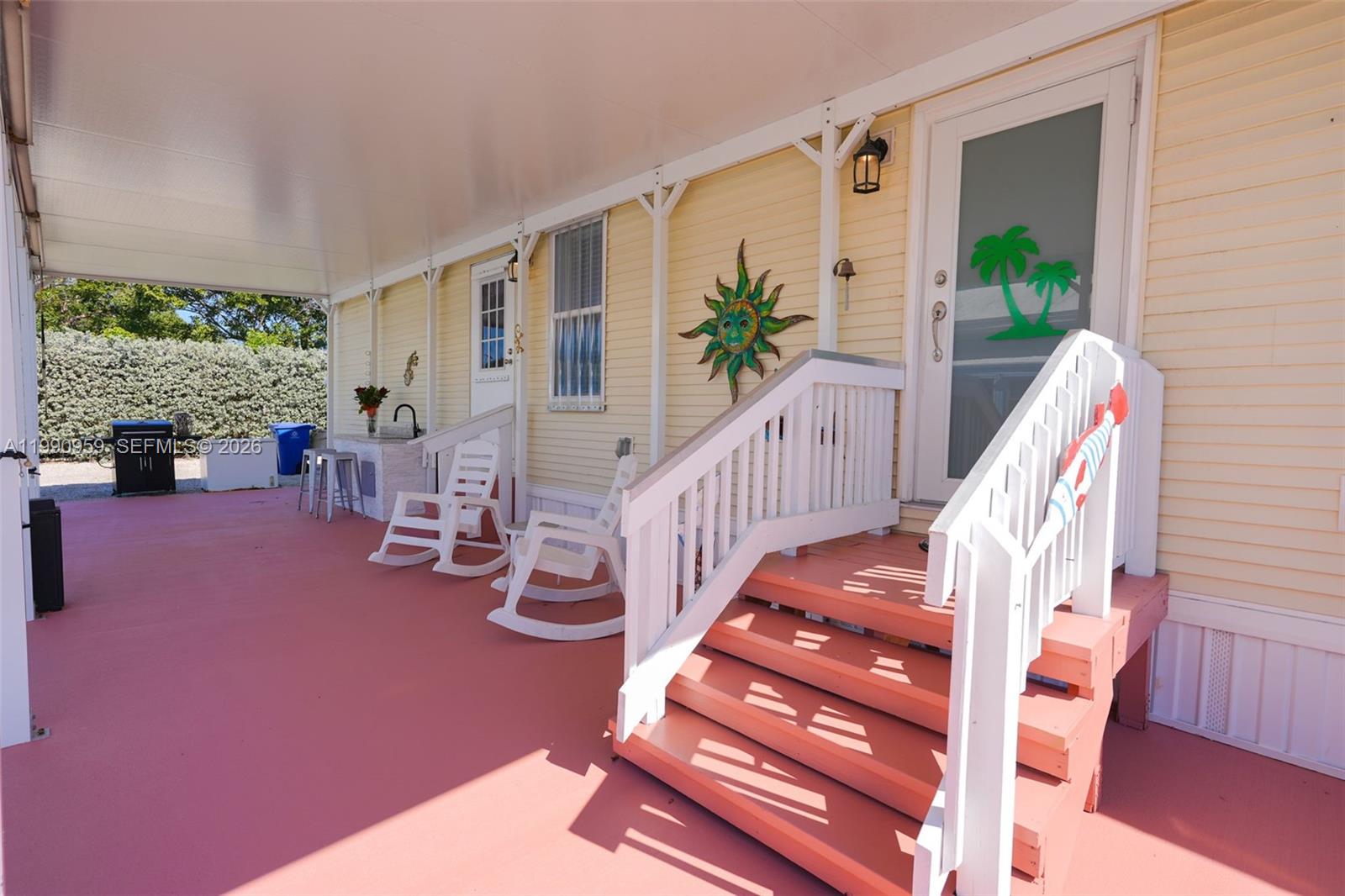 112 Tweedy Pie Terrace Key Largo, FL 33037 - Photo 6 of 39 a view of entryway with wooden floor and windows