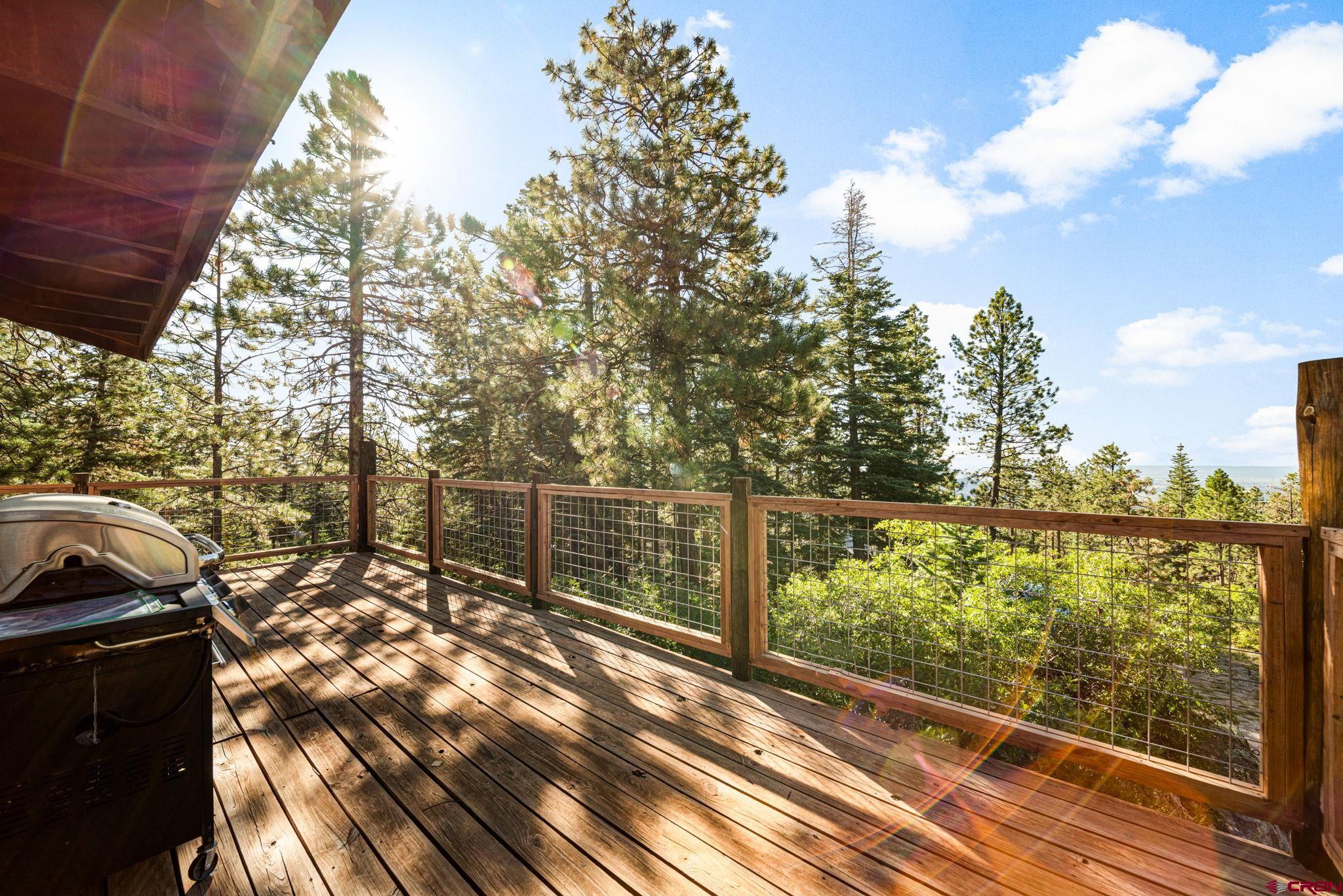 1875 Silver Mesa Driveway Durango, CO 81301 - Photo 16 of 27 a view of a lake from a balcony