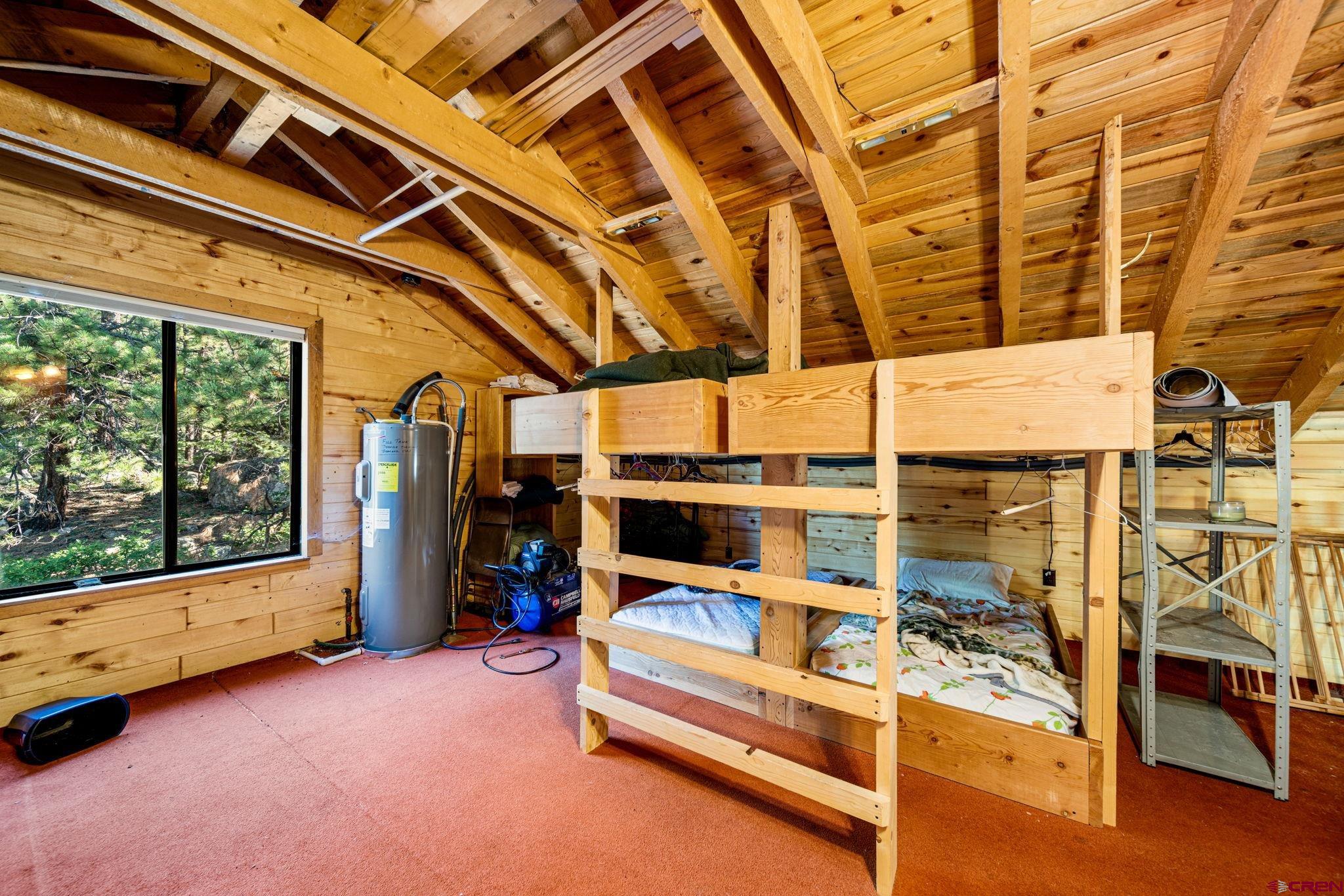 1875 Silver Mesa Driveway Durango, CO 81301 - Photo 21 of 27 a view of a room with racks on the wall