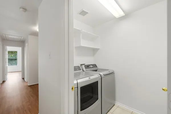 a view of a storage and utility room in a house