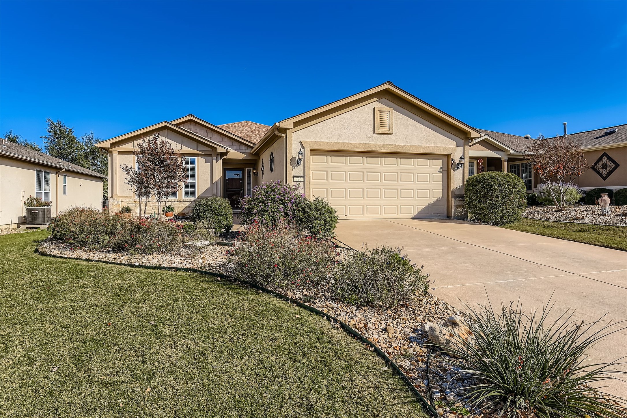 723 Independence Creek Lane Georgetown, TX 78633 - Photo 1 of 1 a front view of a house with garden