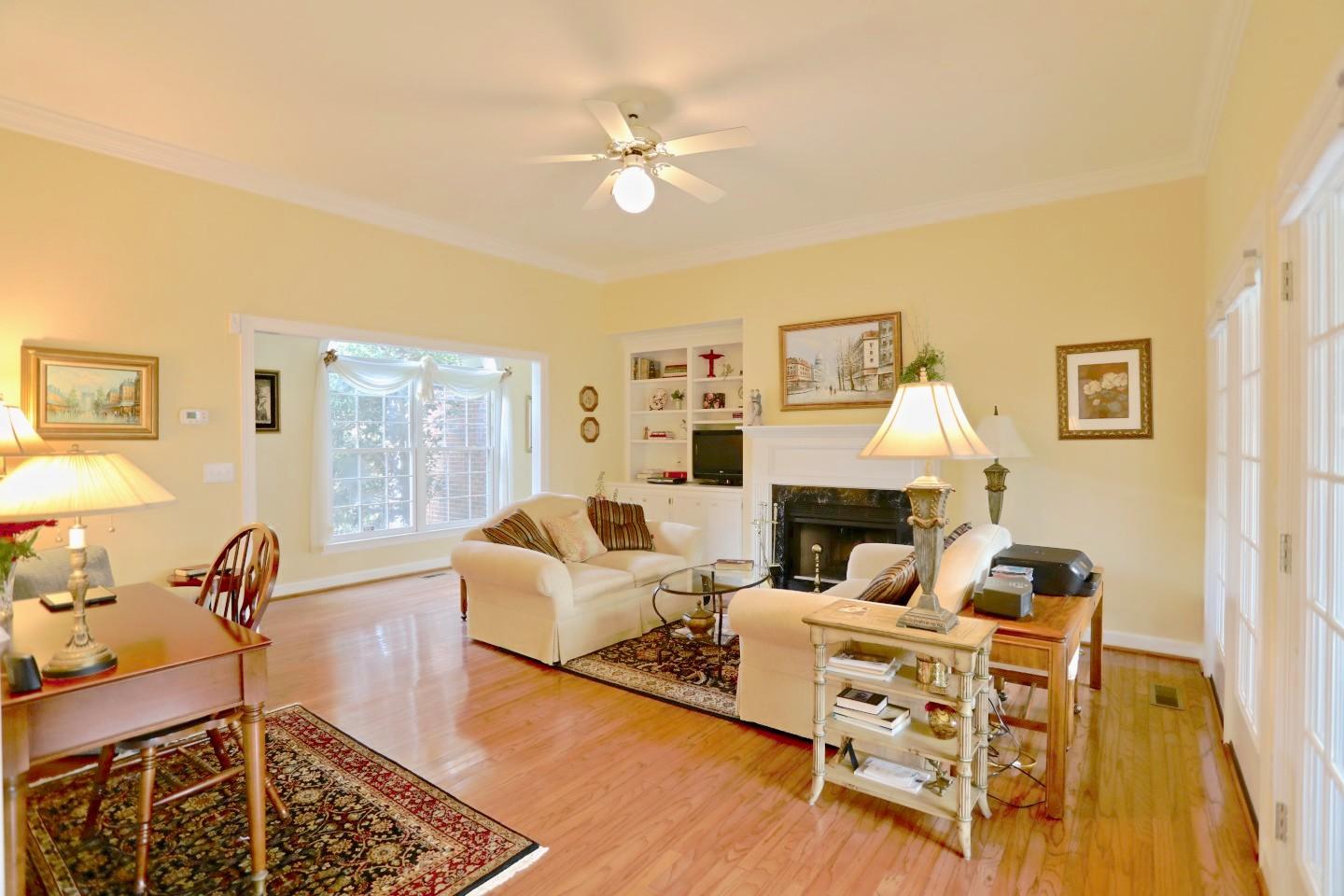 670 Burning Tree Road Pinehurst, NC 28374 - Photo 6 of 28 Living Room with woodburning fireplace