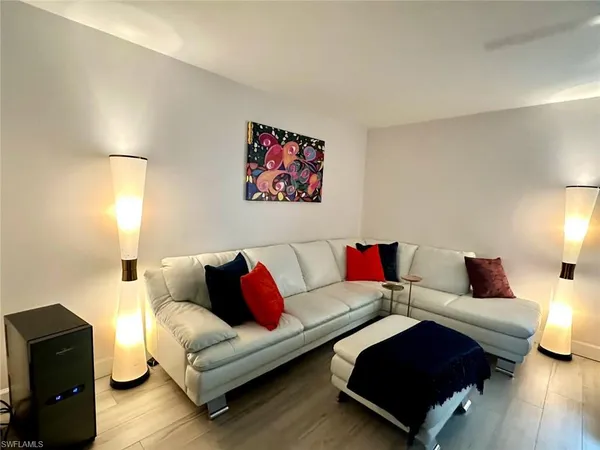 a living room with furniture and a couch