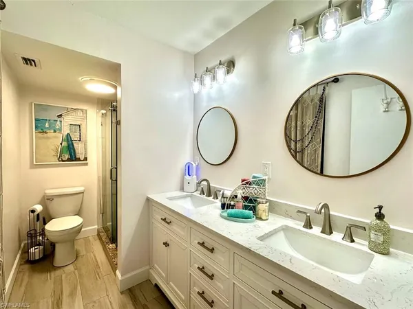 a swimming pool with outdoor seating and yard