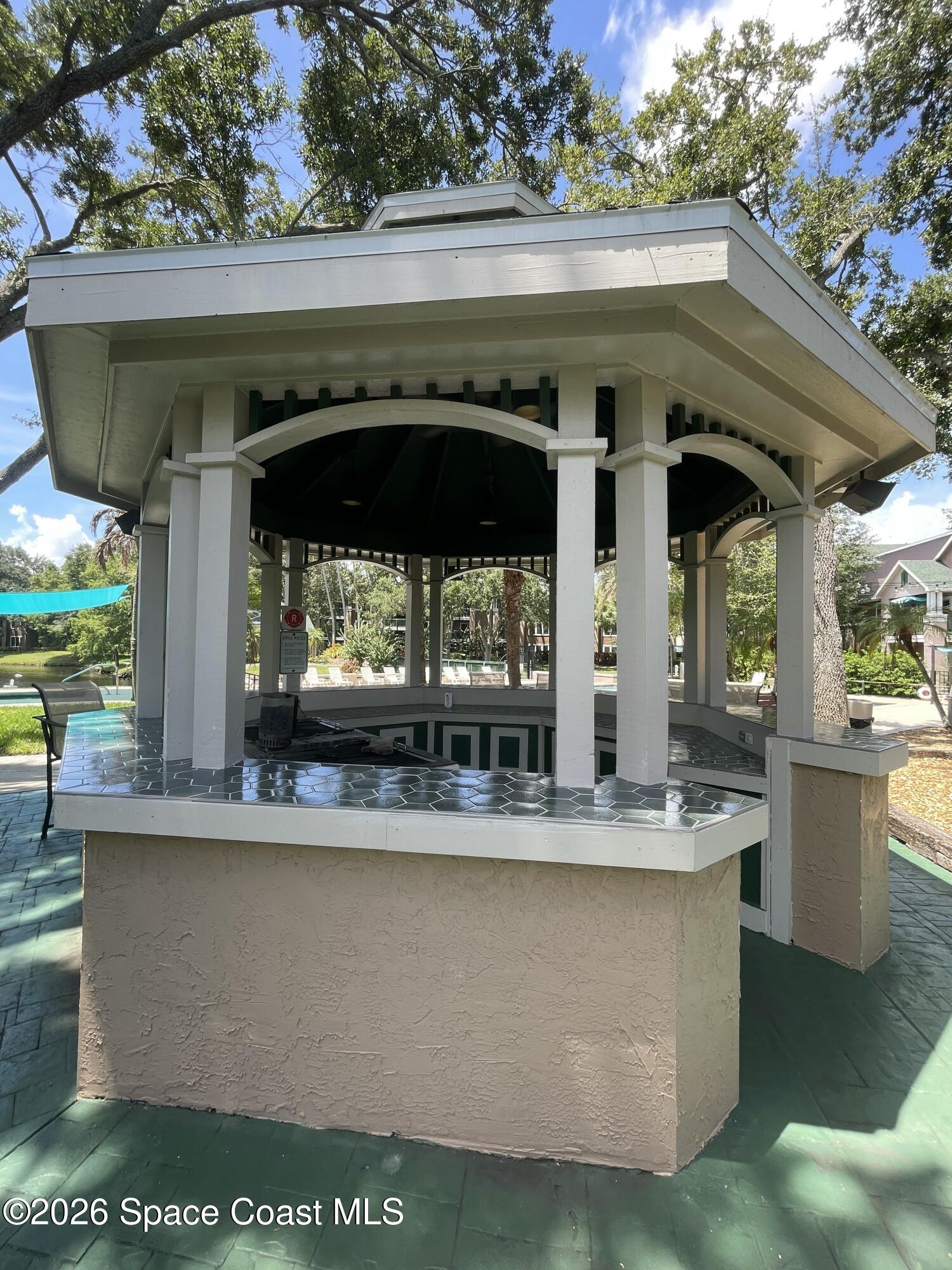 7667 North Wickham Road, Unit 519 Melbourne, FL 32940 - Photo 21 of 29 Covered Grilling Station