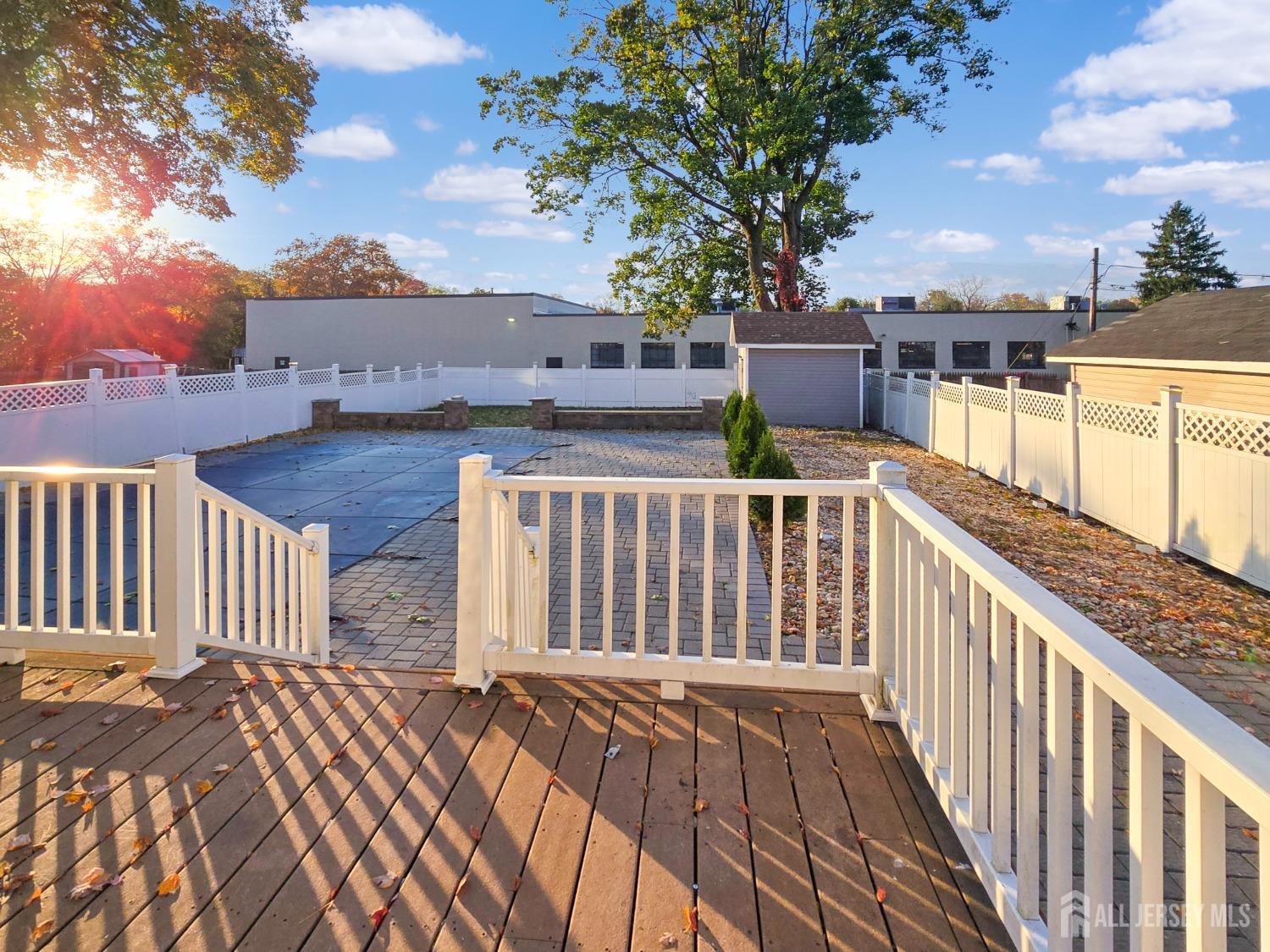 338 Runyon Avenue Middlesex, NJ 08846 - Photo 17 of 27 a balcony with wooden floor and city view