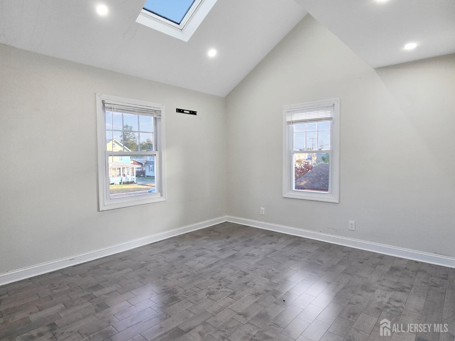 338 Runyon Avenue Middlesex, NJ 08846 - Photo 9 of 27 an empty room with windows
