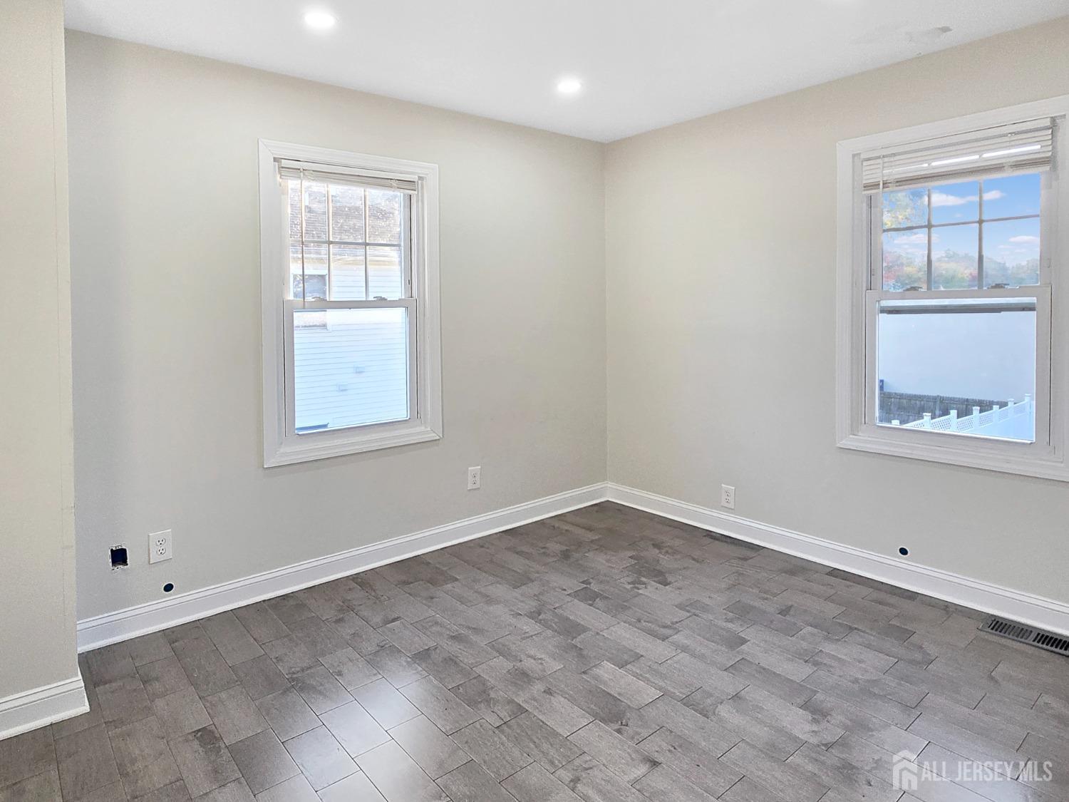 338 Runyon Avenue Middlesex, NJ 08846 - Photo 10 of 27 an empty room with windows