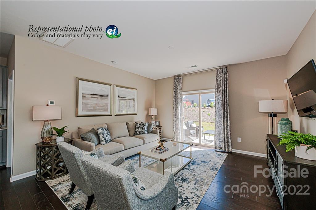 5790 Soft Shell Drive, Unit 277 Lancaster, SC 29720 - Photo 1 of 22 a living room with furniture and wooden floor