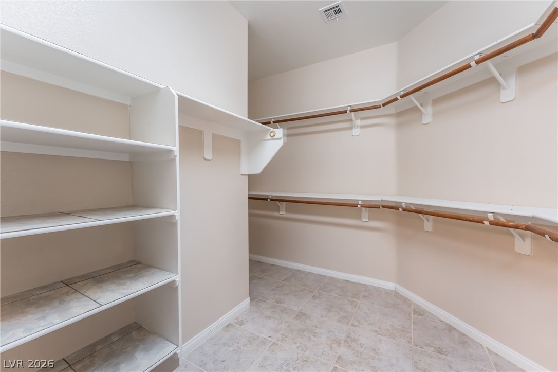 10481 Riverside Park Avenue Las Vegas, NV 89135 - Photo 24 of 51 Primary Bedroom walk in closet