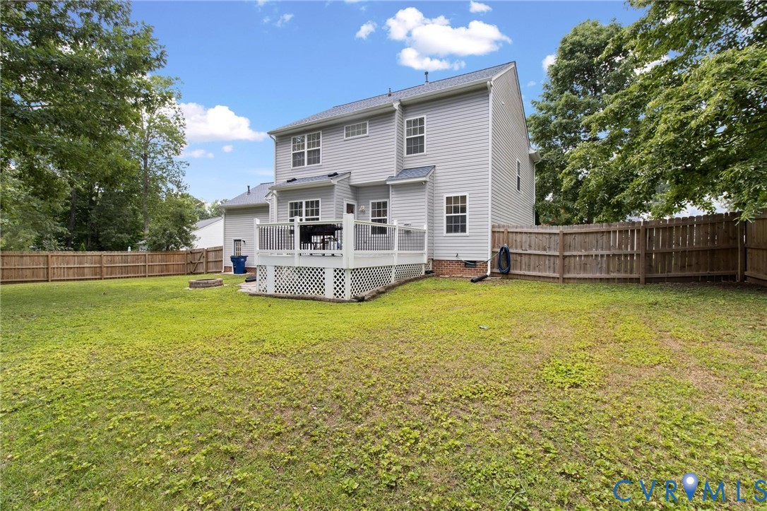 7807 Clover Ridge Place Chesterfield, VA 23832 - Photo 45 of 51 Expansive green lawn with a full privacy fence