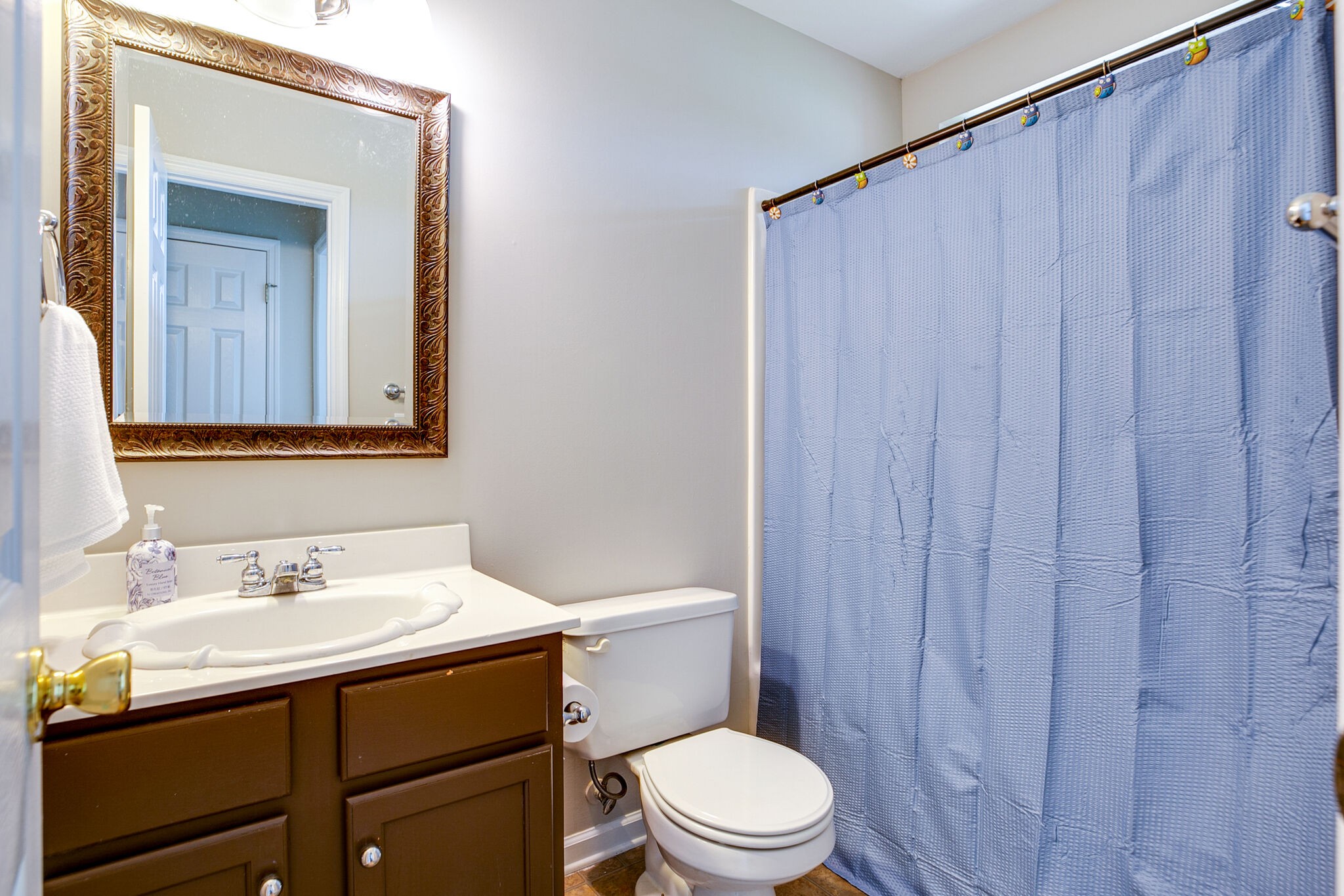 207 Towbridge Drive Murfreesboro, TN 37129 - Photo 25 of 31 a bathroom with a sink a toilet and shower