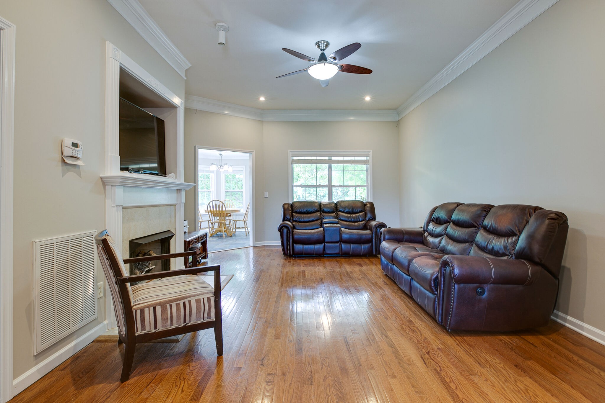 207 Towbridge Drive Murfreesboro, TN 37129 - Photo 6 of 31 a living room with furniture fireplace and a flat screen tv