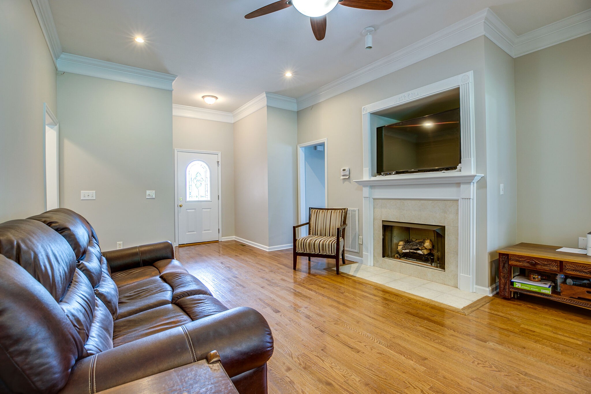 207 Towbridge Drive Murfreesboro, TN 37129 - Photo 9 of 31 a living room with furniture and a fireplace