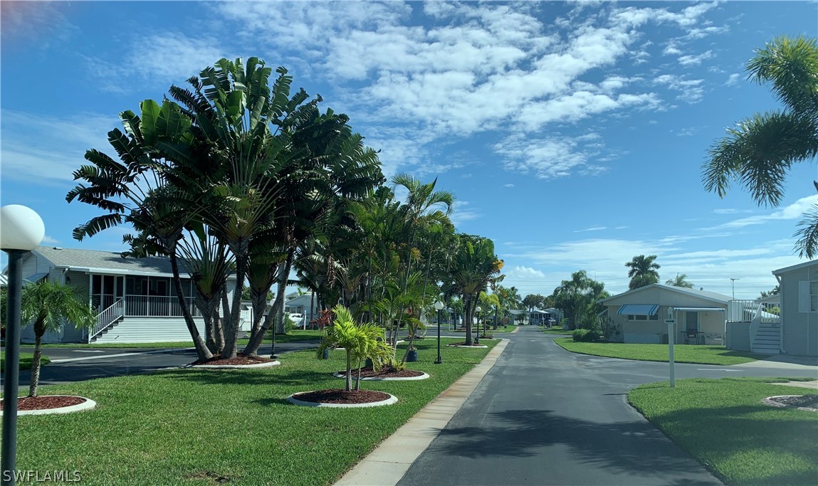 19681 Summerlin Road, Unit 195 Fort Myers, FL 33908 - Photo 11 of 12 a view of a park with plants and trees