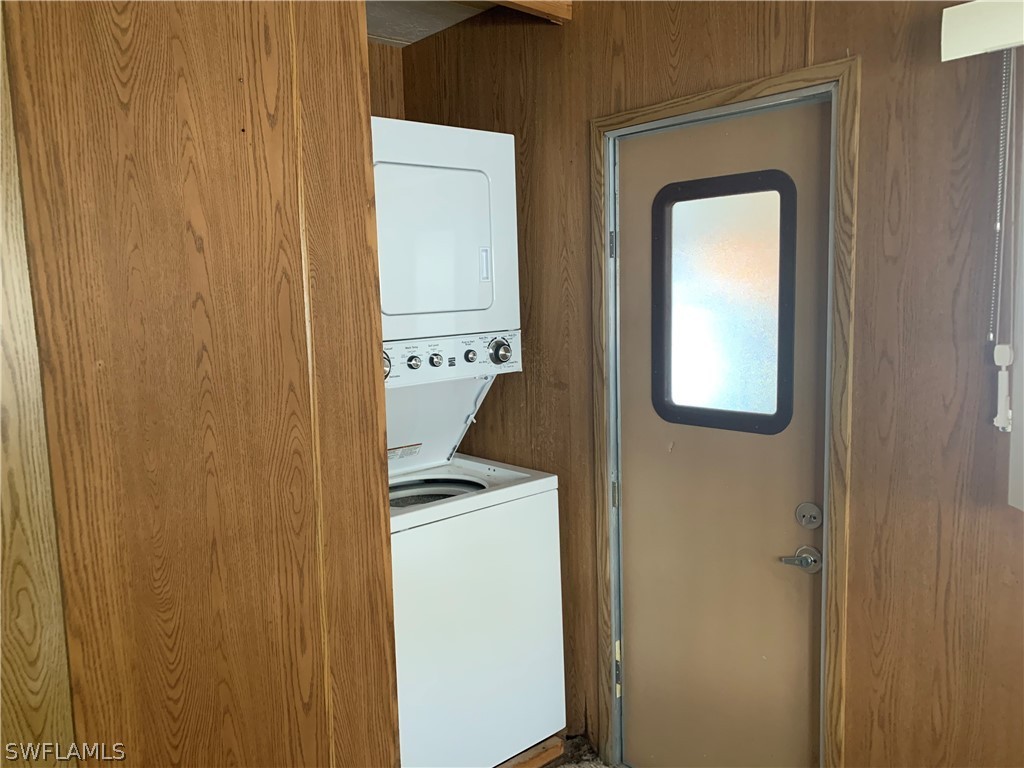 19681 Summerlin Road, Unit 195 Fort Myers, FL 33908 - Photo 5 of 12 a utility room with a washer and dryer