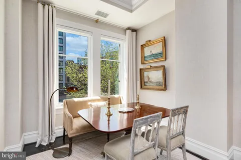 a view of a dining room with furniture