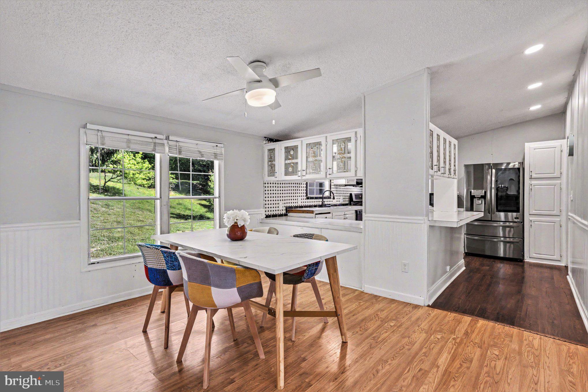 2002 David Drive Edgewood, MD 21040 - Photo 9 of 26 a view of a dining room with furniture window and wooden floor