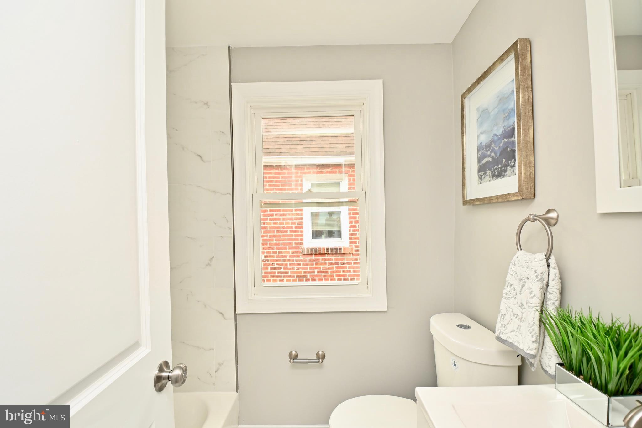 6420 Blair Road Northwest Washington, DC 20012 - Photo 19 of 30 Hall bath w/neutral colors