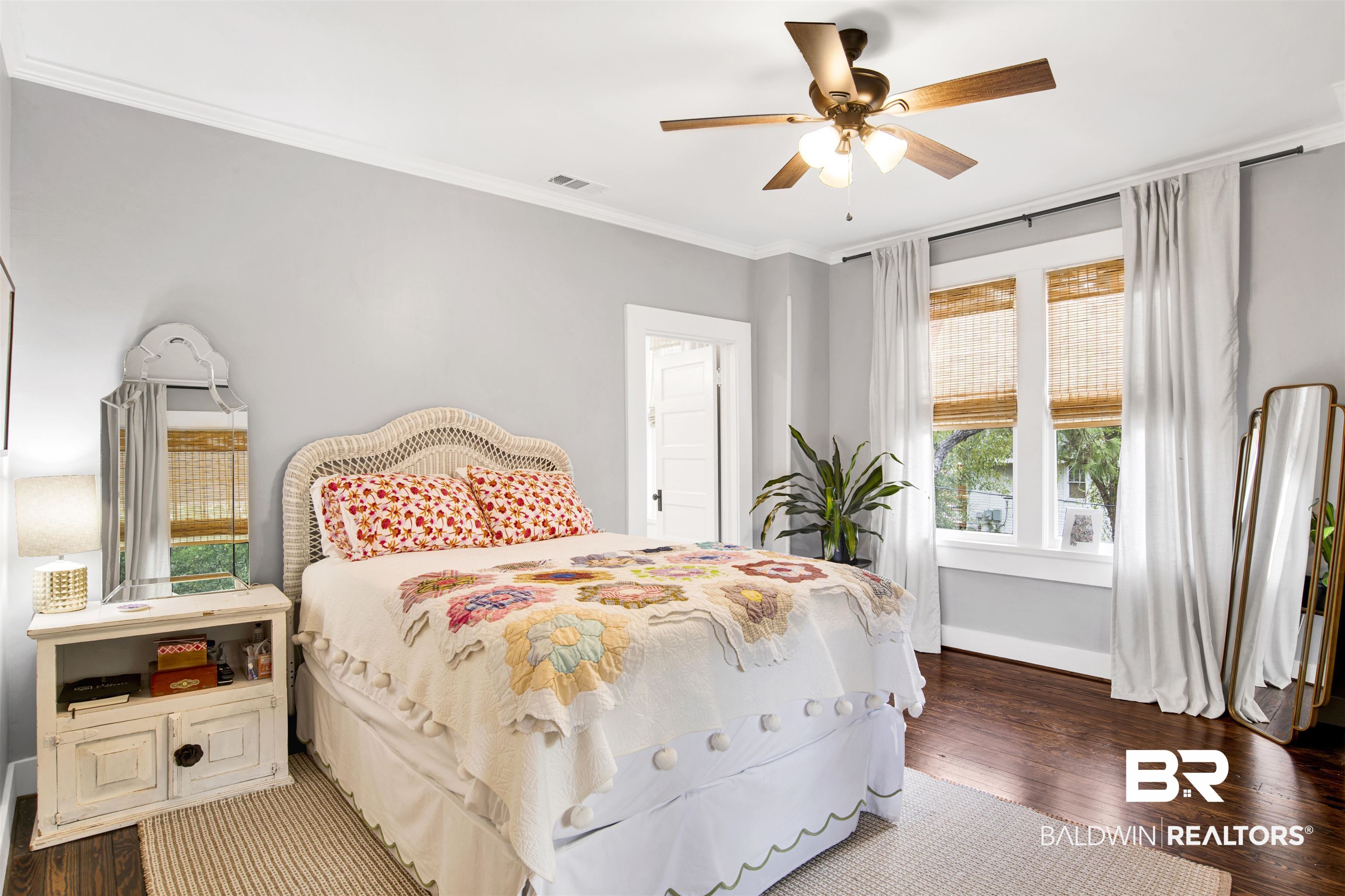 123 Macy Place Mobile, AL 36604 - Photo 12 of 35 Bedroom featuring dark wood-style flooring, ornamental molding, and ceiling fan