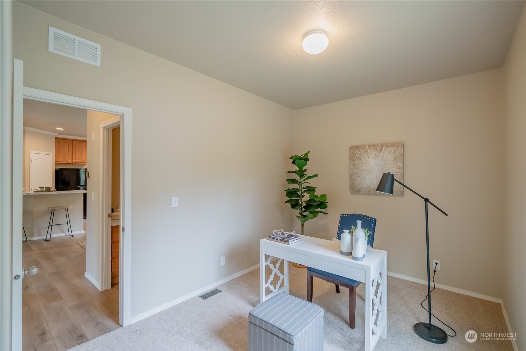 16819 Erickson Road Southwest Longbranch, WA 98351 - Photo 13 of 15 a room with a table and chairs