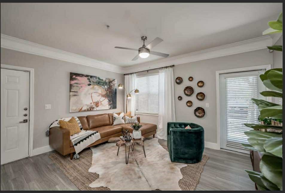 529 Barker-Clodine Road, Unit JUNIPER Houston, TX 77094 - Photo 20 of 21 a living room with furniture a rug and a window