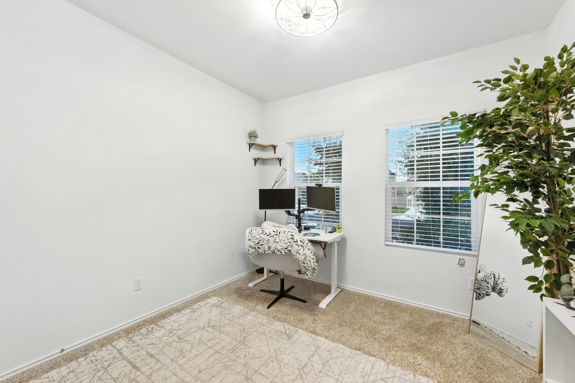 112 Cherry Ridge Road Georgetown, TX 78628 - Photo 21 of 35 a living room with furniture and a window