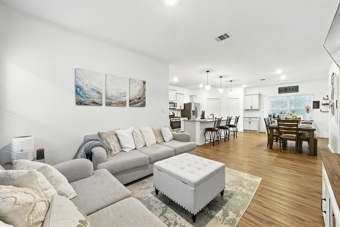 112 Cherry Ridge Road Georgetown, TX 78628 - Photo 9 of 35 a living room with furniture and kitchen view