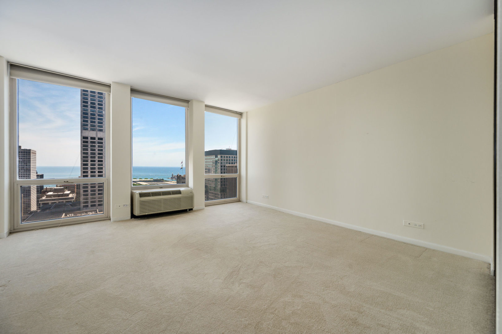 111 East Chestnut Street, Unit 37F Chicago, IL 60611 - Photo 11 of 23 a view of a livingroom with a big room
