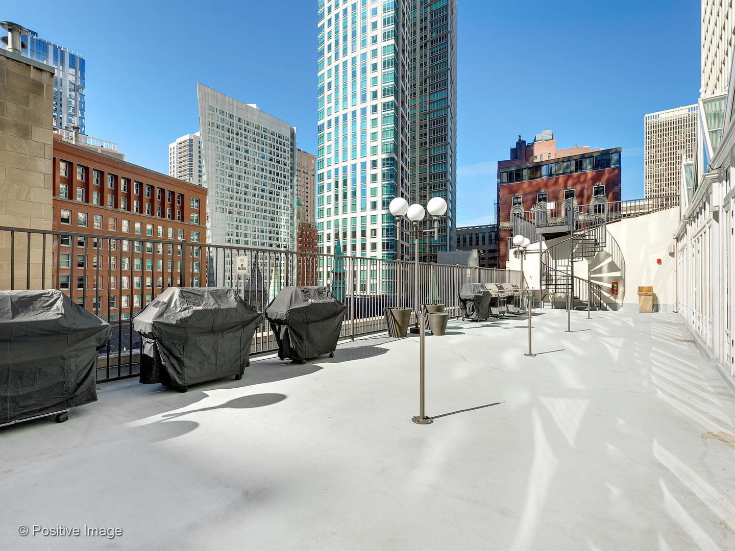 111 East Chestnut Street, Unit 37F Chicago, IL 60611 - Photo 19 of 23 a view of a terrace with furniture
