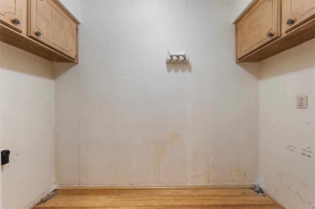 413 Texas Avenue Hewitt, TX 76643 - Photo 10 of 26 Laundry room with light wood-style flooring