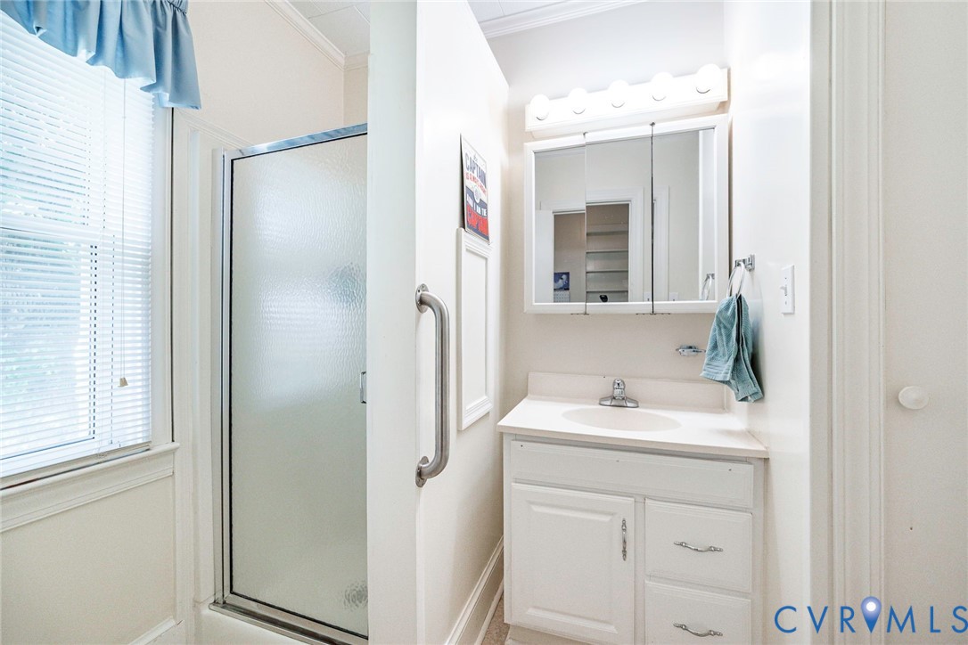 4912 Water View Road Water View, VA 23180 - Photo 29 of 42 White vanity with integrated sink, chrome faucet,