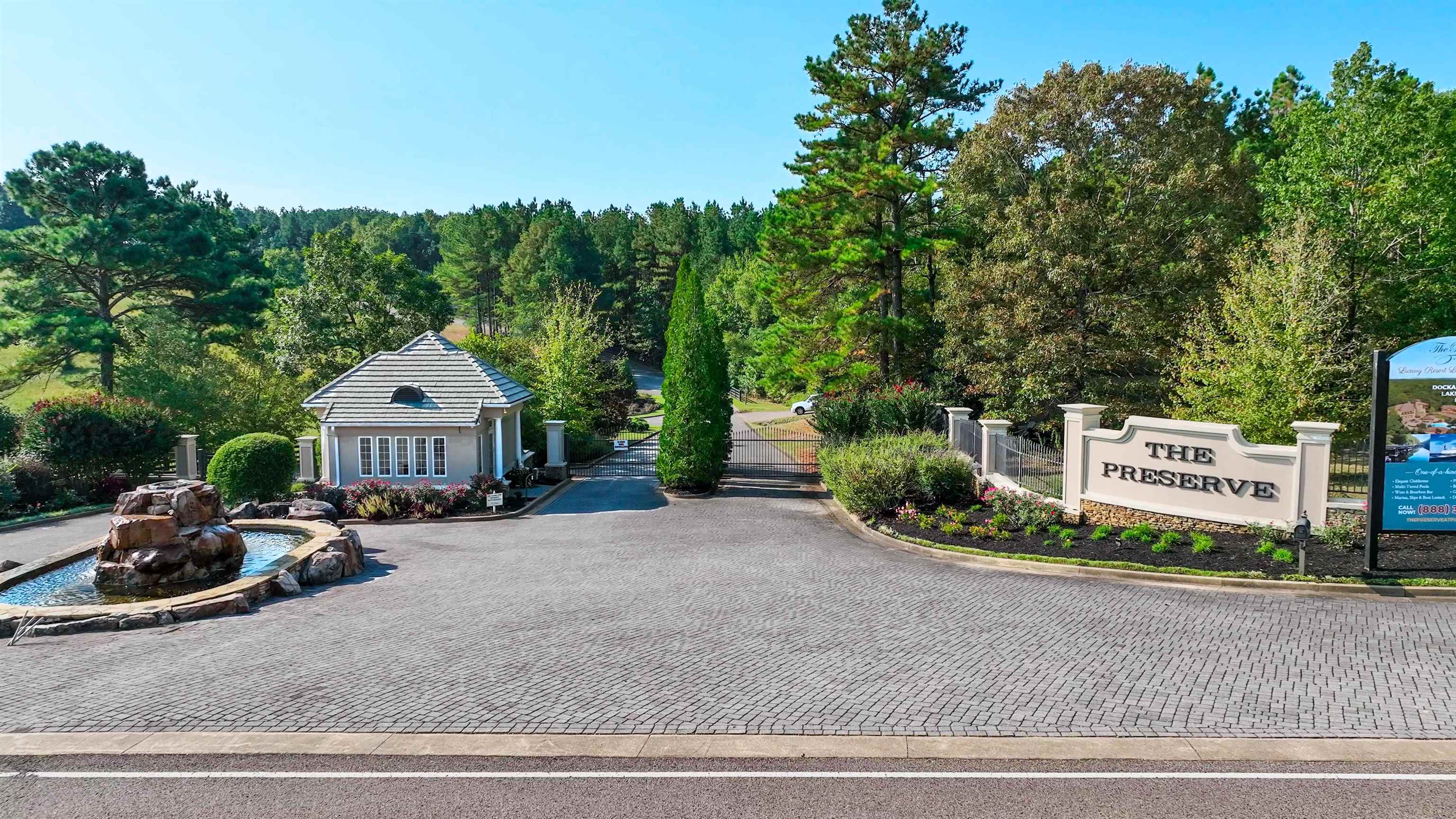 50 Legacy Pointe Savannah, TN 38372 - Photo 36 of 40 a sign board with a garden and parking space