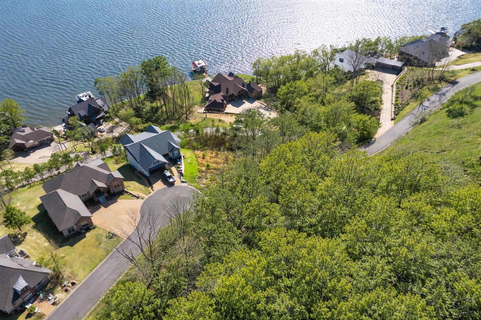 50 Legacy Pointe Savannah, TN 38372 - Photo 10 of 40 a view of a house with a yard and garden