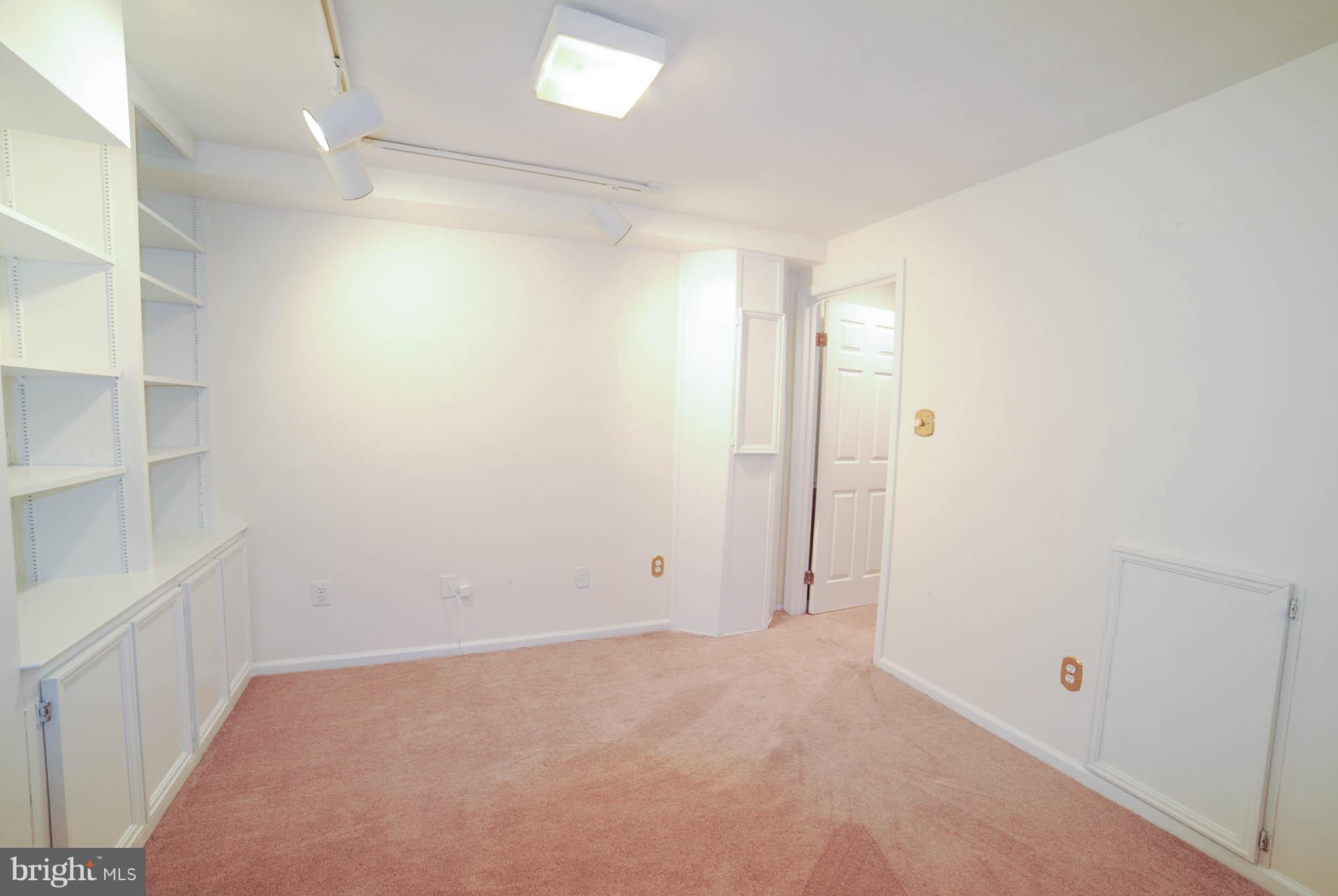8303 Lindside Way Springfield, VA 22153 - Photo 27 of 30 Other room in basement with built-ins and closet.