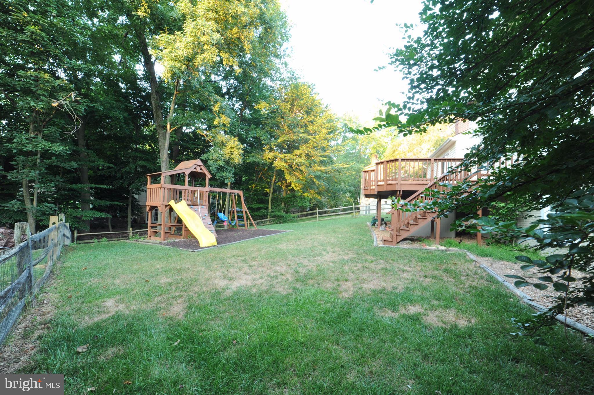 8303 Lindside Way Springfield, VA 22153 - Photo 28 of 30 Fully fenced yard and playset conveys