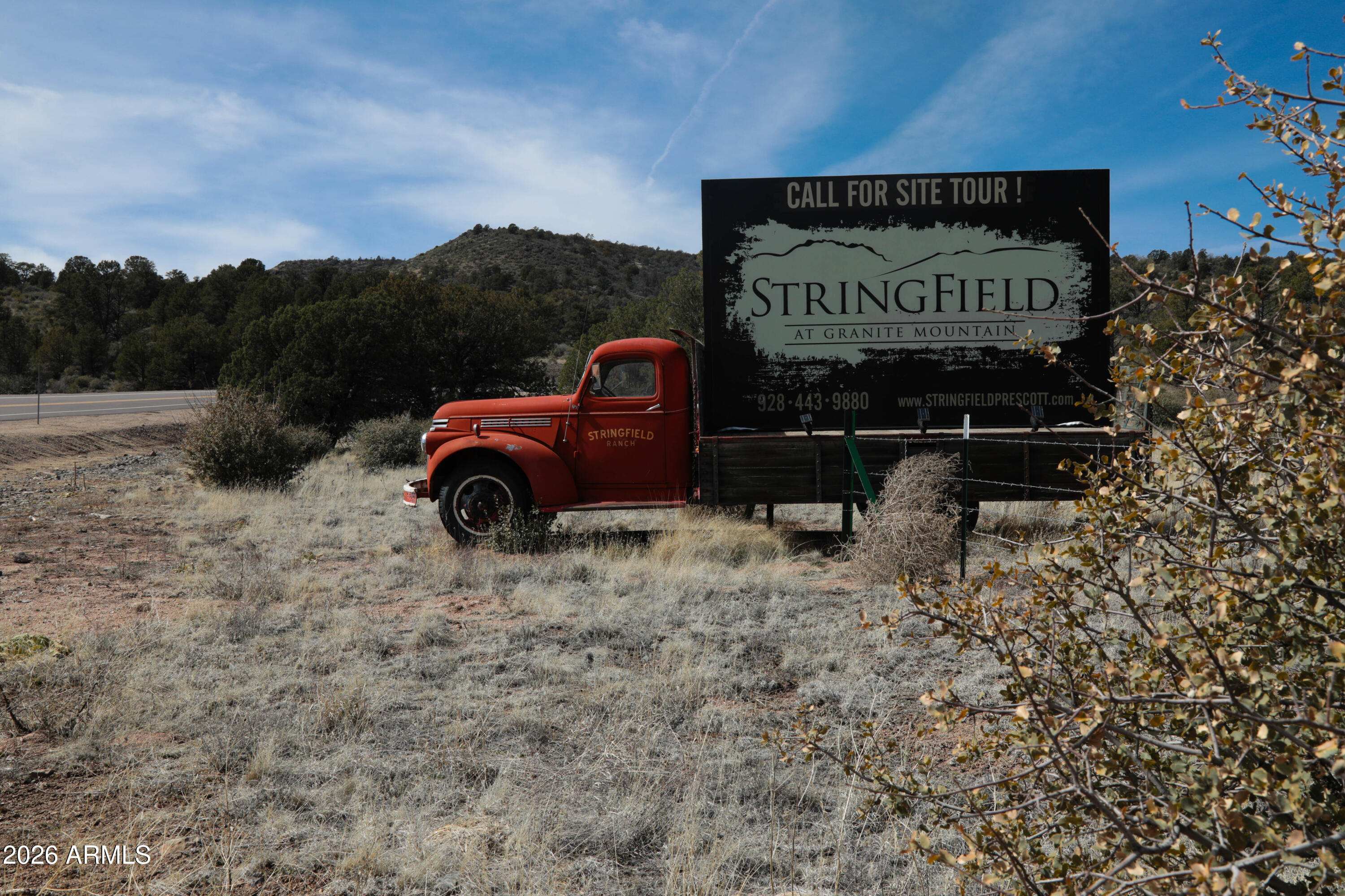 2588 West Black Ridge Trail, Unit 30 Prescott, AZ 86305 - Photo 1 of 32 a sign on the side of the road