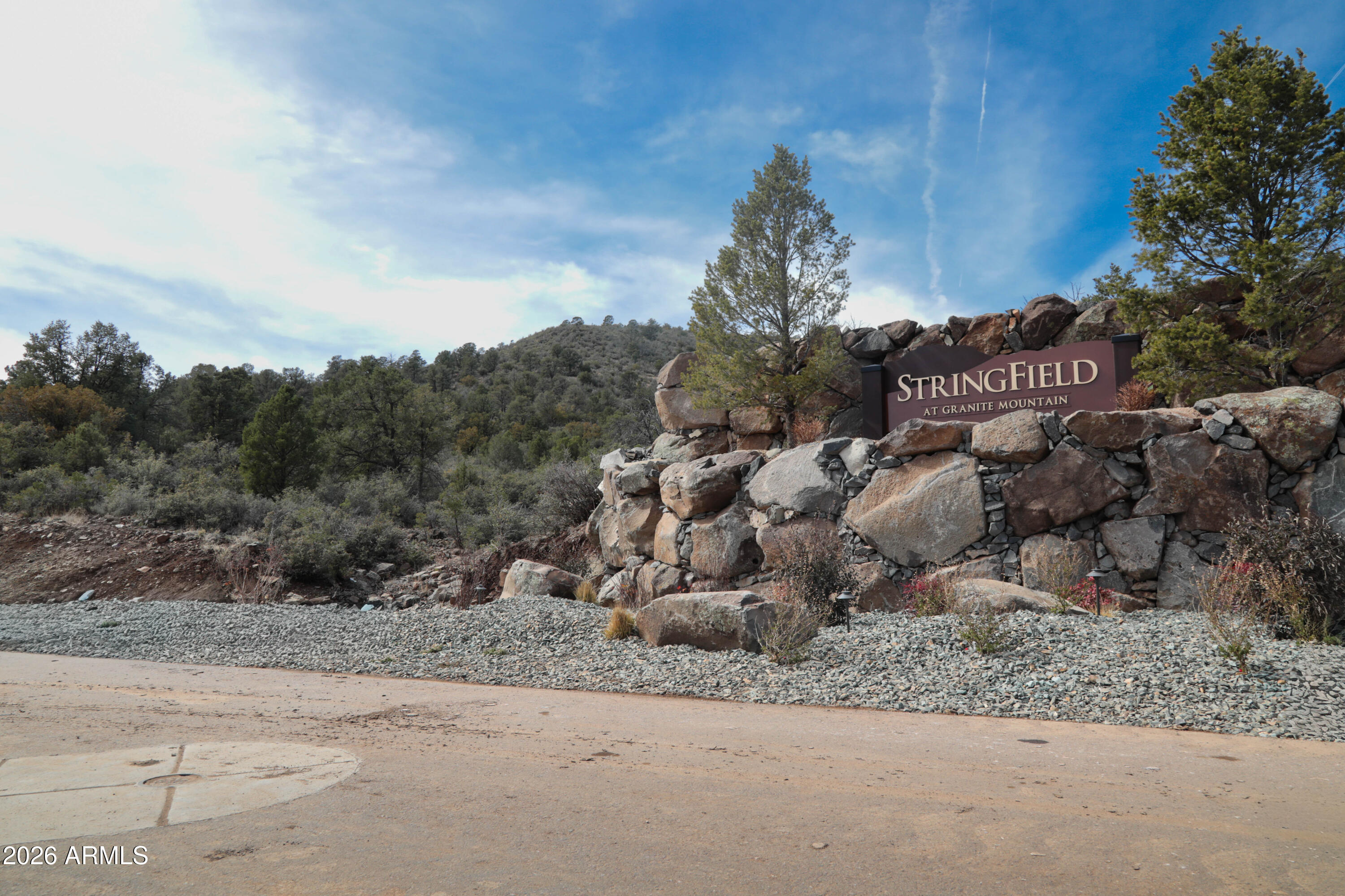 2588 West Black Ridge Trail, Unit 30 Prescott, AZ 86305 - Photo 3 of 32 a view of a house with a street