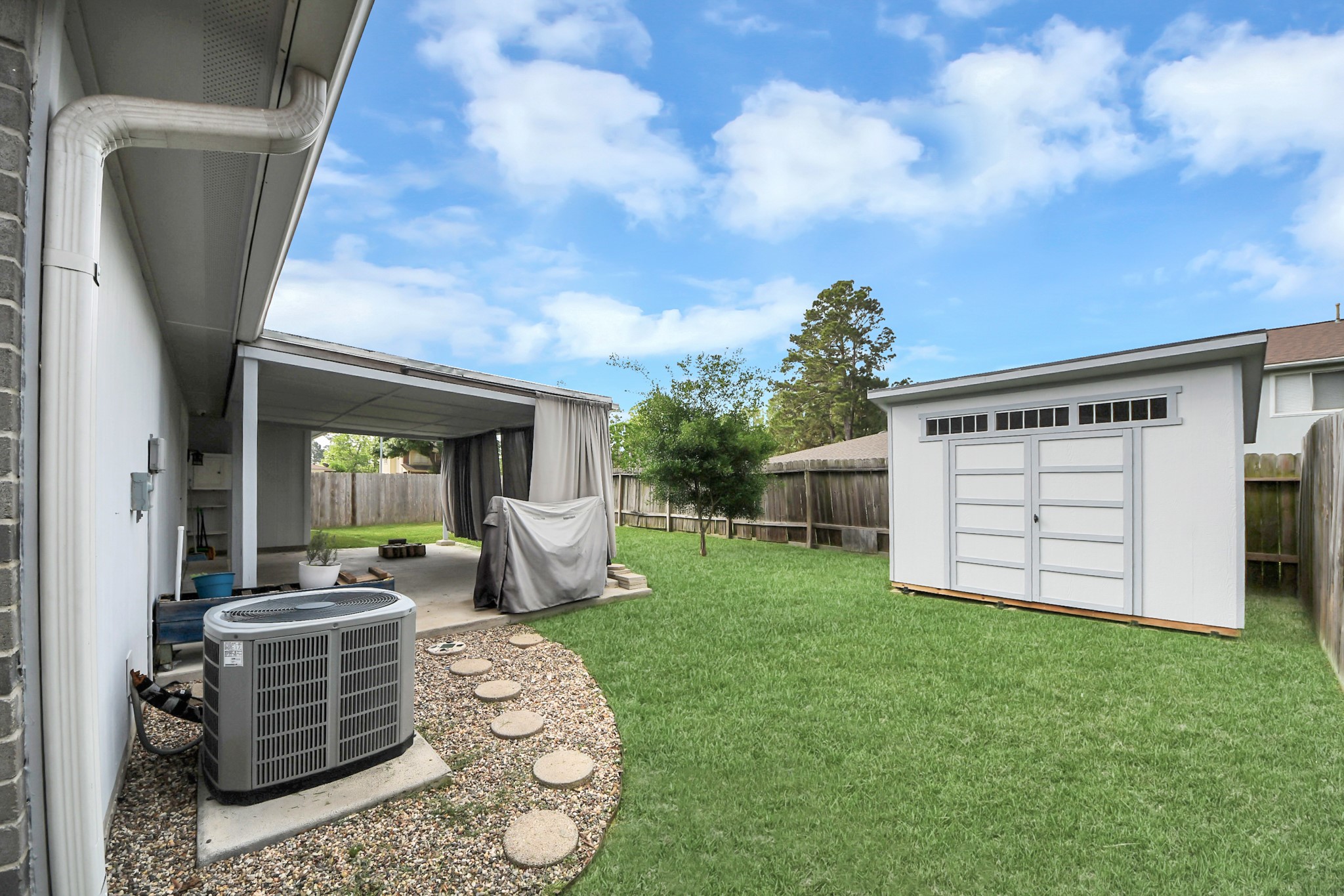 28707 Stapleford Street Spring, TX 77386 - Photo 34 of 38 a view of a house with a porch