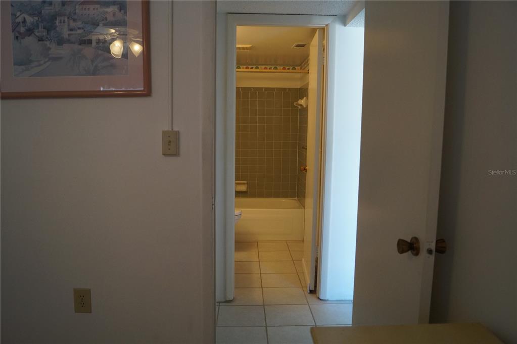 7701 Starkey Road, Unit 408 Seminole, FL 33777 - Photo 18 of 28 a bathroom with a shower