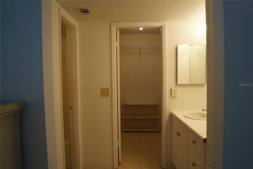 7701 Starkey Road, Unit 408 Seminole, FL 33777 - Photo 24 of 28 a bathroom with a shower and a sink
